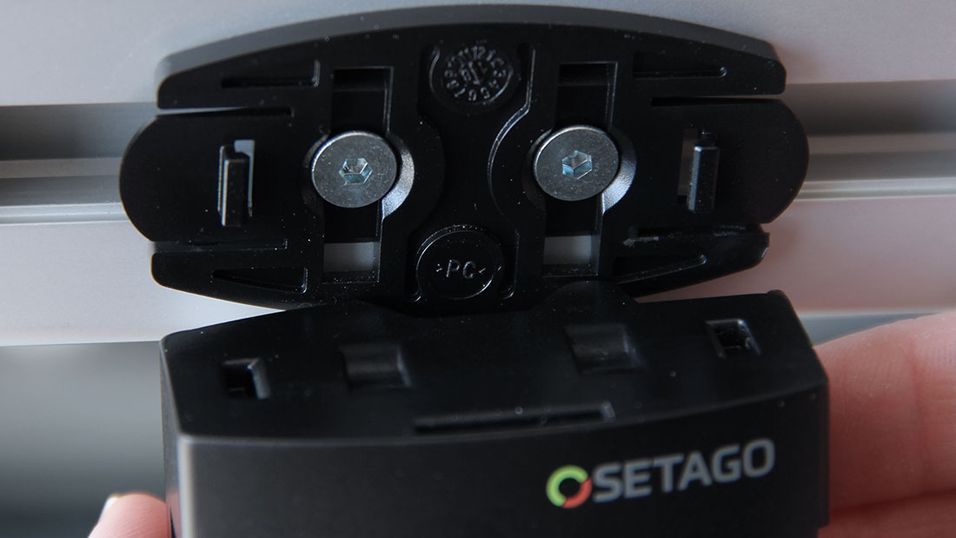 Pick by Light sensor is mounted on an adapter plate