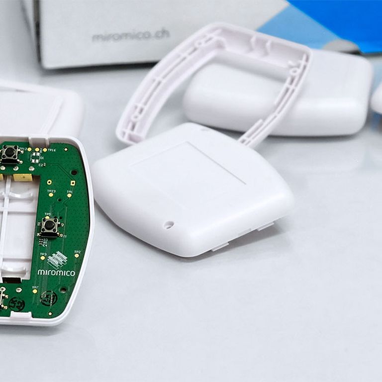 Injection moulded IoT button with electronics