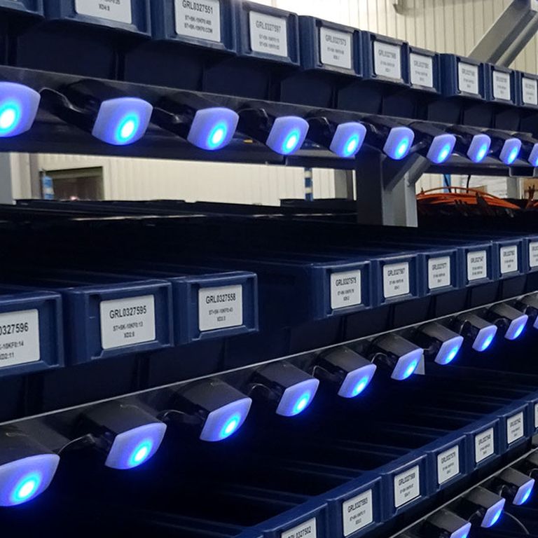 Assembly line with Pick by Light sensors