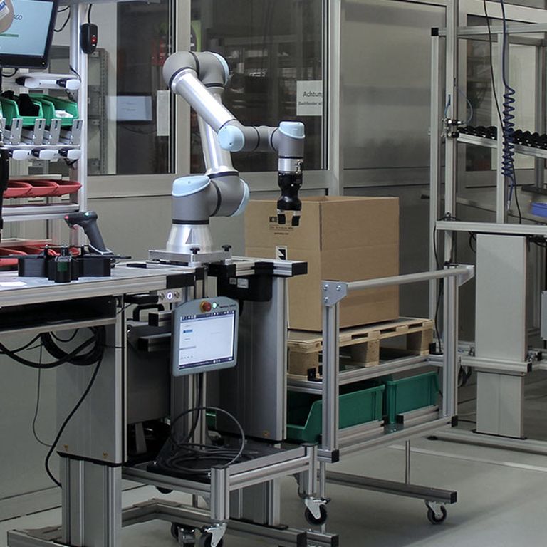Smart Factory Assembly workstation with cobot, Pick by Light system and mobile transport robot