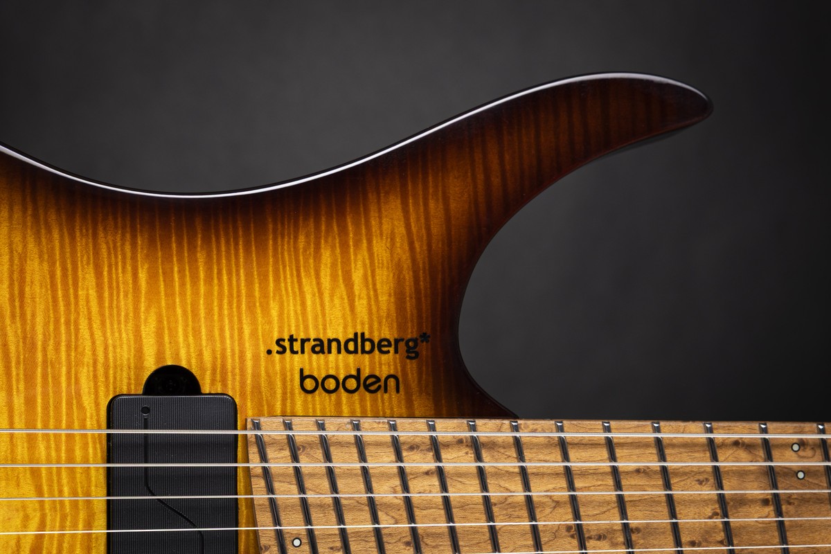Strandberg Boden Original N2 in Amber Haze showing curved body top design and premium finish details