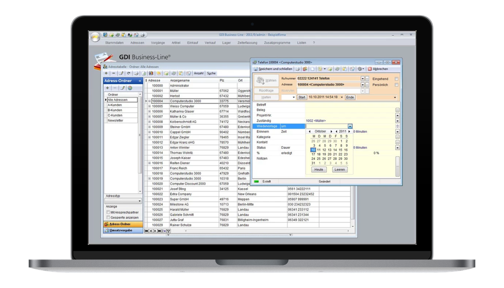 Laptop-Bildschirm mit der GDI Business-Line-Software, auf dem eine Adressliste, ein Kalender und ein Popup-Fenster mit Telefonangaben angezeigt werden.