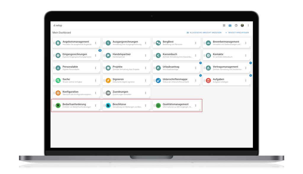 Ein Laptop, auf dem ein Dashboard mit verschiedenen Verwaltungs- und Aufgabenmodulen angezeigt wird, die in einem Raster angeordnet sind.