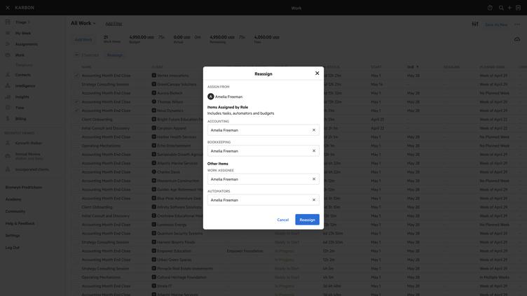 A screenshot of the Karbon interface showing the reassignment of work items across multiple roles, including accounting, bookkeeping, and automators, within a project management tool.