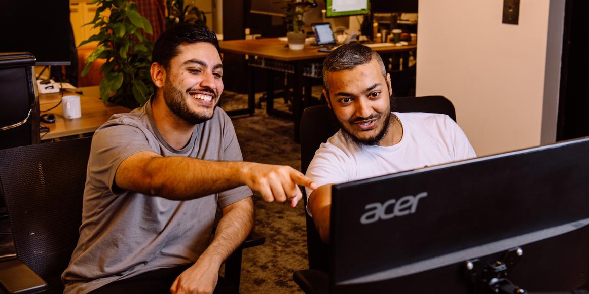 Engineers Pulkit and Qutub from the Karbon team working together on the Karbon shipathon.