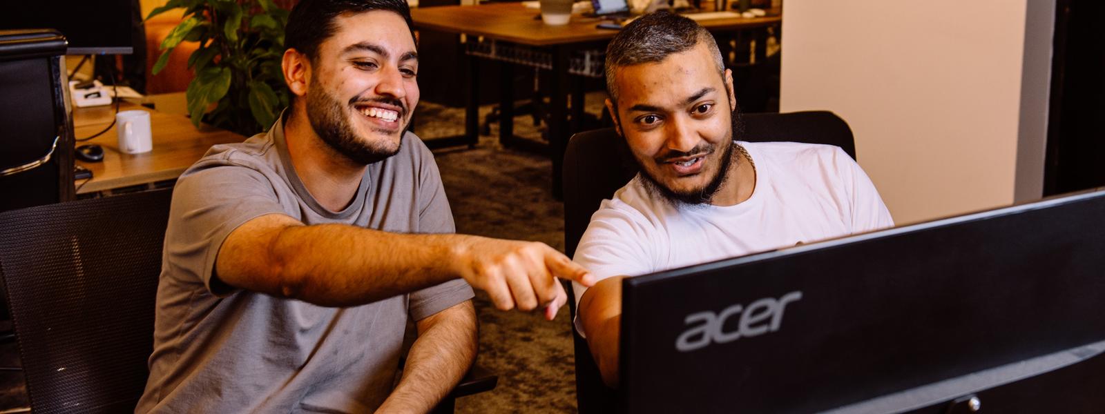 Engineers Pulkit and Qutub from the Karbon team working together on the Karbon shipathon.