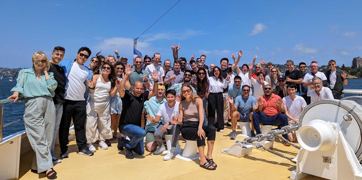The Sydney Karbon team celebrating Christmas 2023 on the Sydney Harbour.