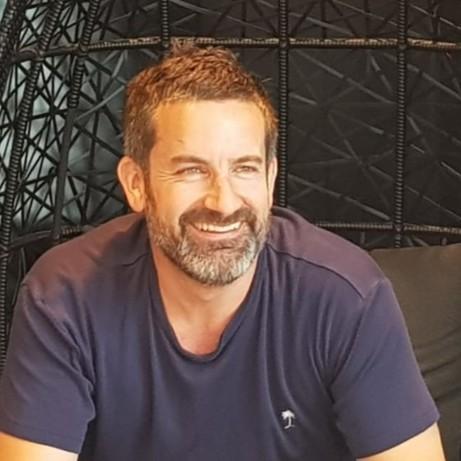 Jared Baker has been appointed the Managing Director APAC of Karbon. In his new role, Jared will lead the growth of Karbon across Australia and APAC, further enabling accounting firms to modernise and better support their clients. This is an image of Jarad. He has short cropped 'salt and pepper' hair and beard and is wearing a navy blue tshirt.