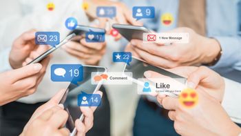 closeup of people looking at their phones, many social media reactions