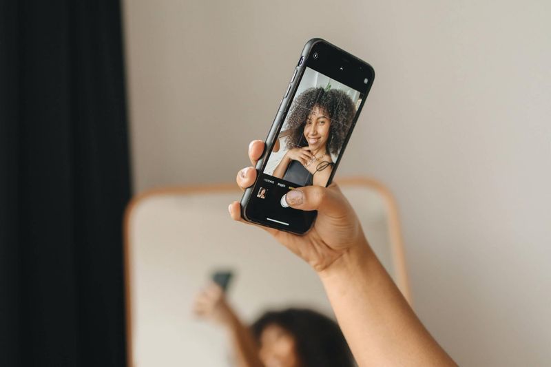 Girl takes a selfie on her cell phone
