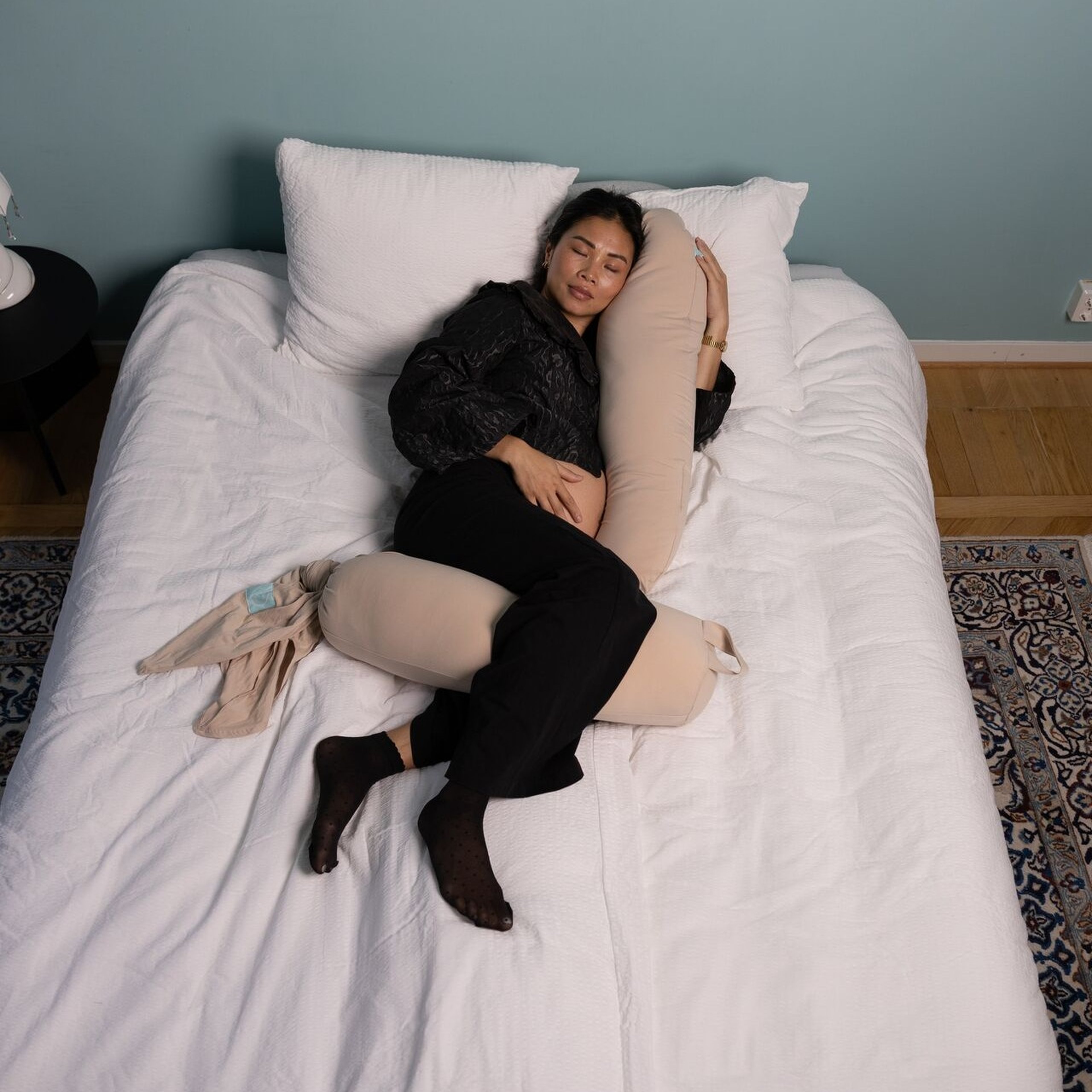 Ar det sakert att ligga pa rygg under graviditeten