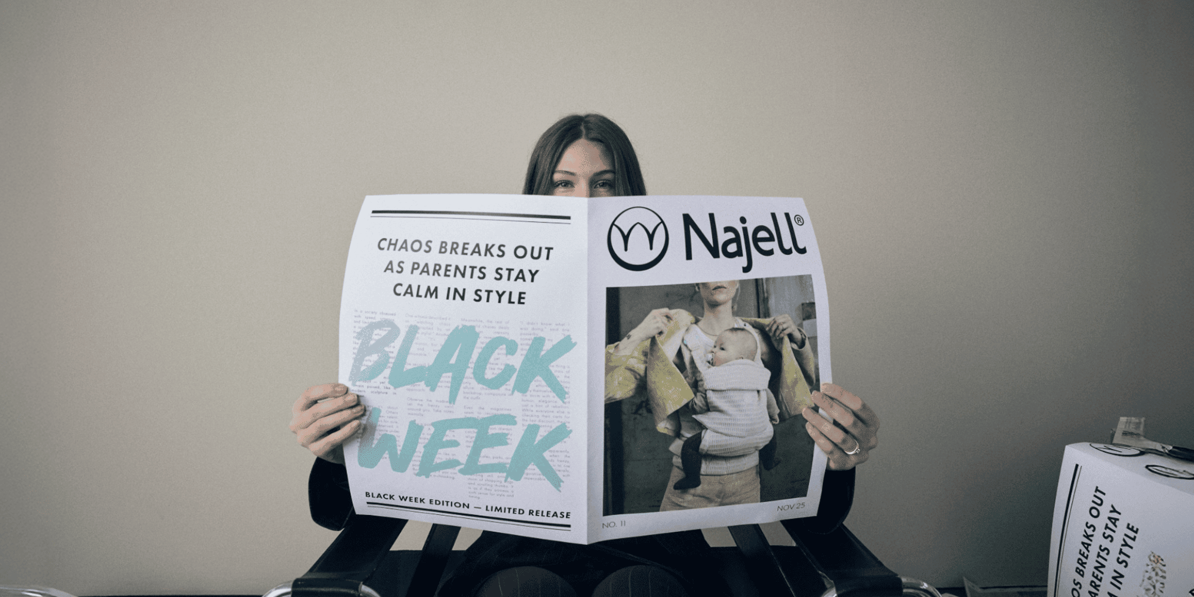 woman holding a newspaper with a ''Black Week Headline'