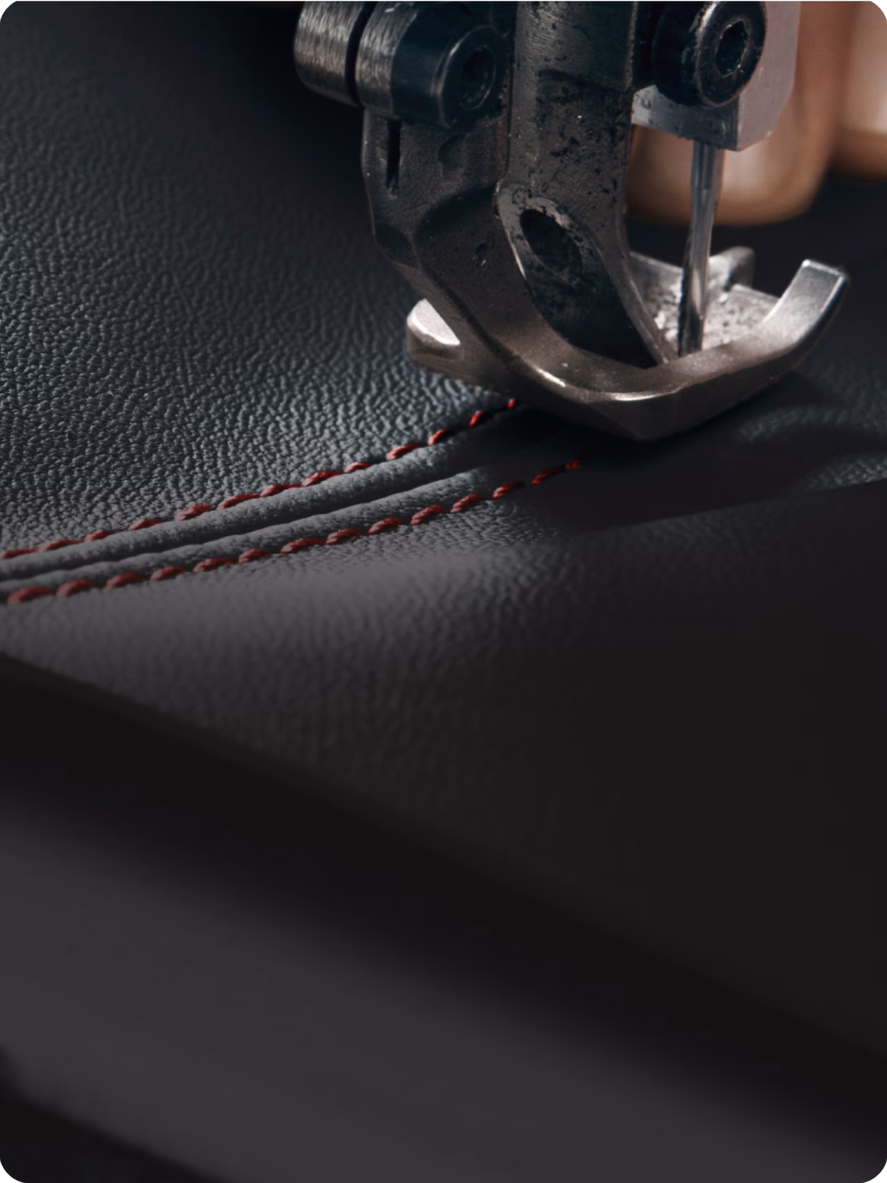 L'écusson Porsche est représenté, gaufré sur le cuir.