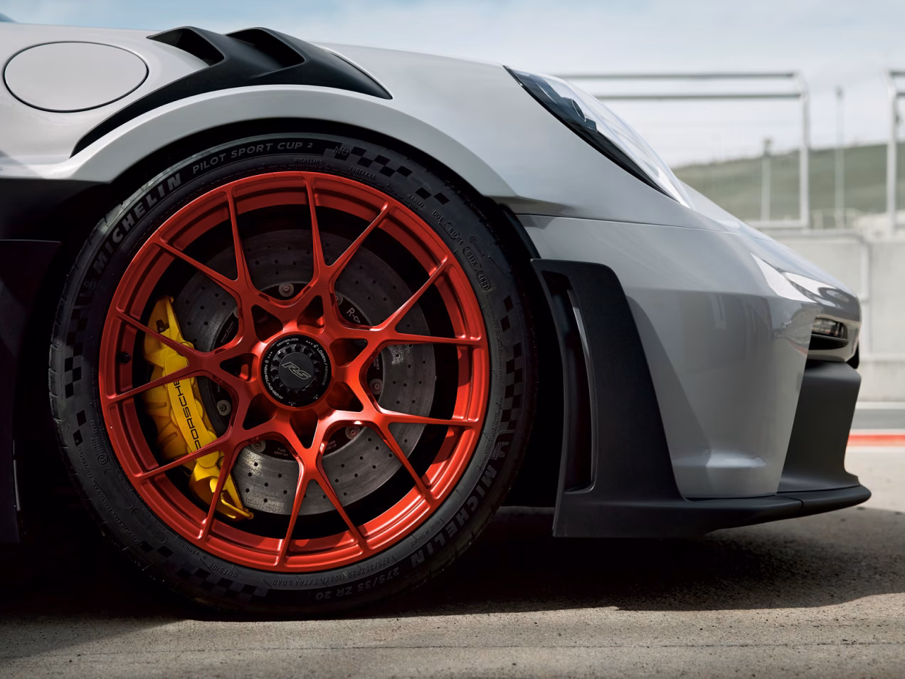 Detailed view of the 911 GT3 wheel painted in anodised Red on the Porsche 911 GT3 RS.