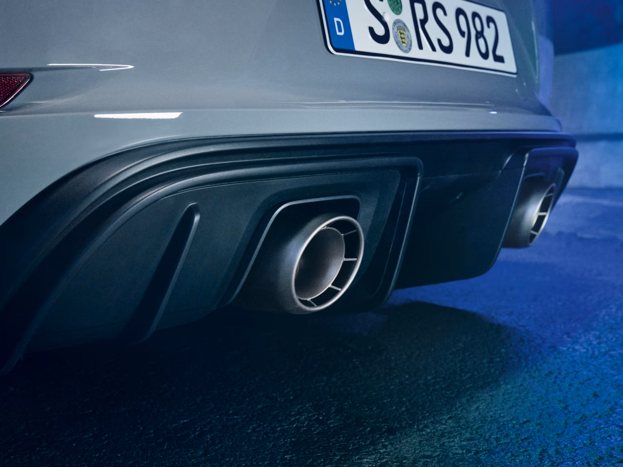 Close-up of the titanium tailpipes of the Porsche 718 Cayman GT4 RS with Weissach Package.
