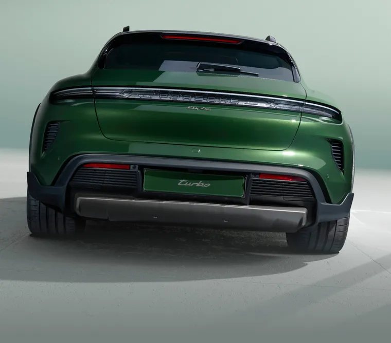 Porsche Taycan Turbo Cross Turismo in Oak Green Metallic Neo. View of rear end from behind.
