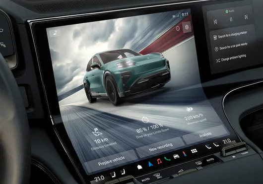 Detailed view of the infotainment system in the Porsche Cayenne Turbo with Sport Chrono package.