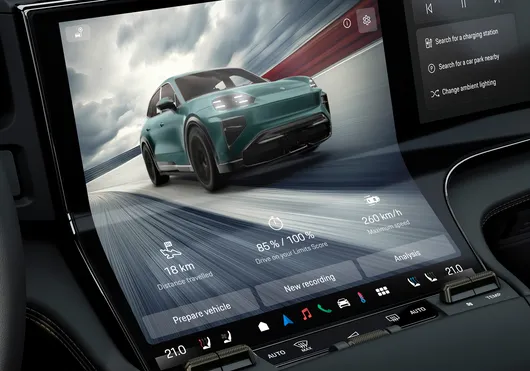 Detailed view of the infotainment system in the Porsche Cayenne Turbo with Sport Chrono package.