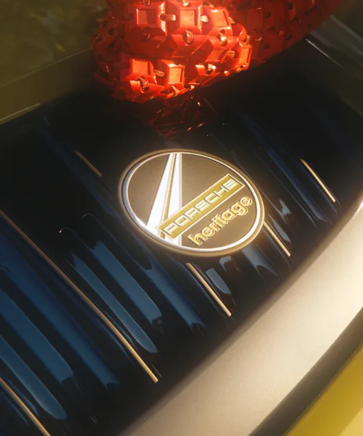 911 Spirit 70のリアグリルのベーンにあるヘリテージ デザイン バッジの詳細ビュー。