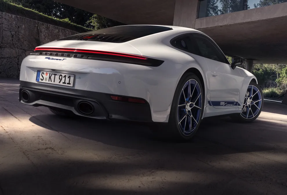 Porsche 911 Carrera T in White. View of rear end from behind.