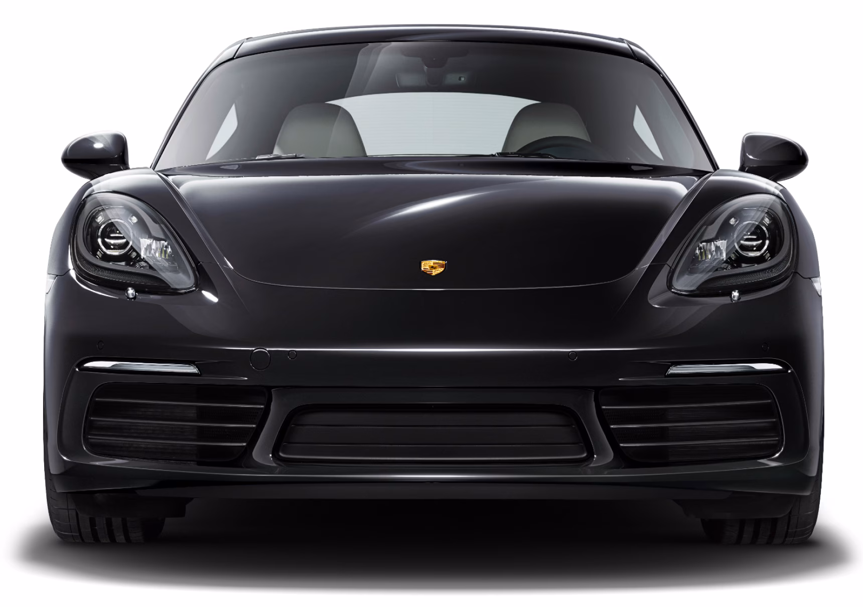Front view of the Porsche 718 Cayman in Jet Black Metallic.