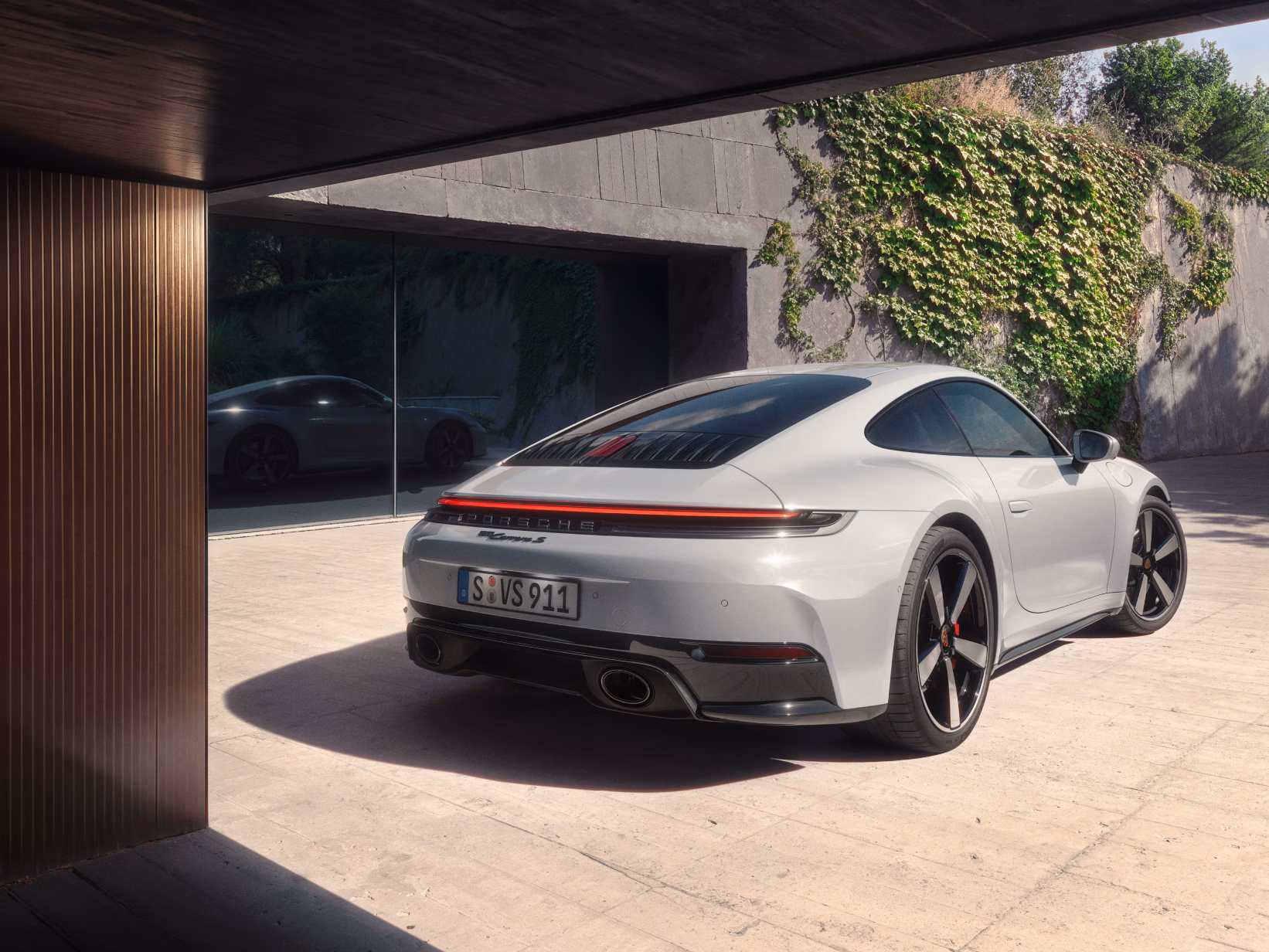 Rear view of the Porsche 911 Carrera S in Ice Grey Metallic.