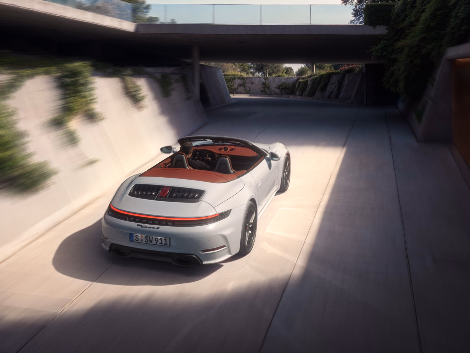 Rear view of the Porsche 911 Carrera S Cabriolet in Ice Grey Metallic.