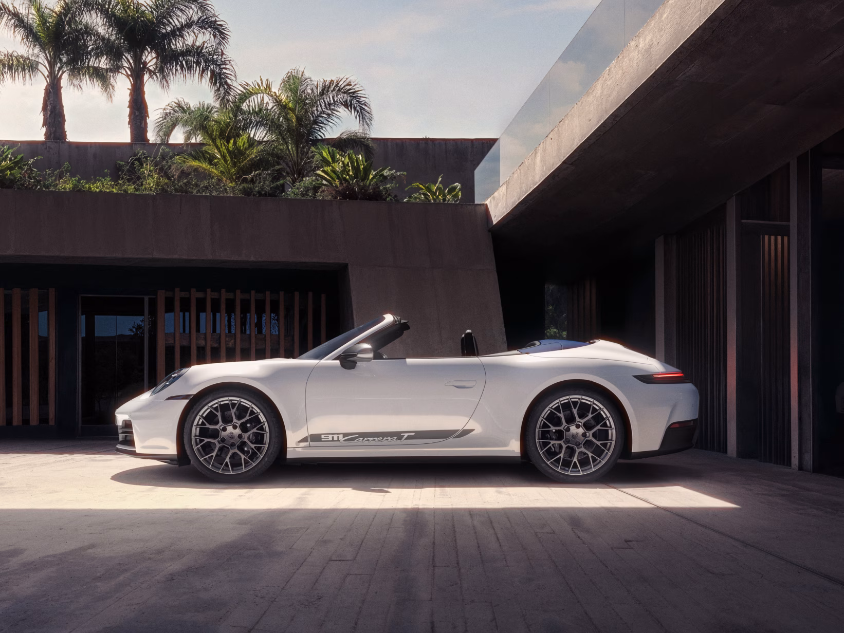 Porsche 911 Carrera T in White. Side view.