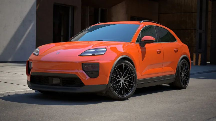 Een oranje Porsche Macan