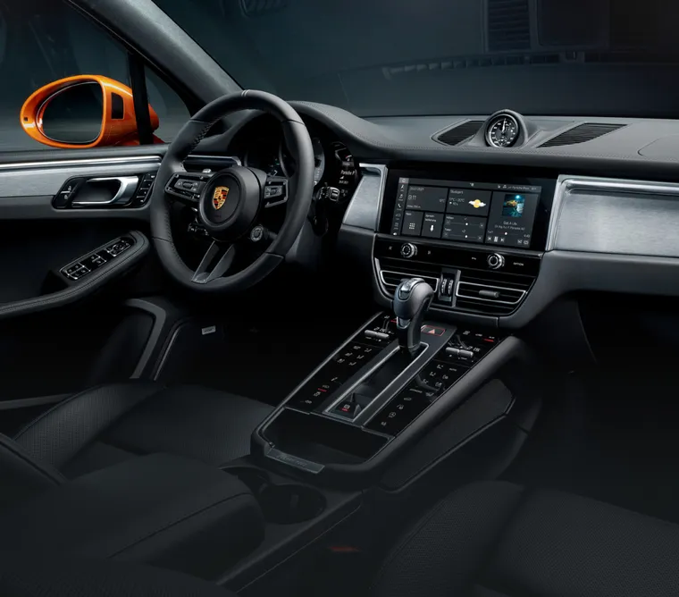 Interior of the Porsche Macan S. View from the passenger seat into the cockpit.