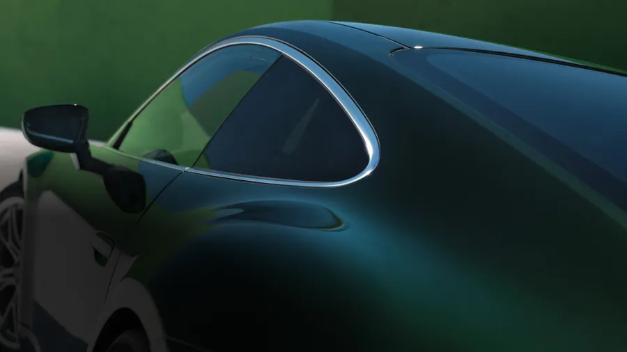 Vue sur le côté de la Porsche 911 GT3 Touring en Oak Green Metallic Neo avec focalisation sur le contour des vitres latérales en aluminium.