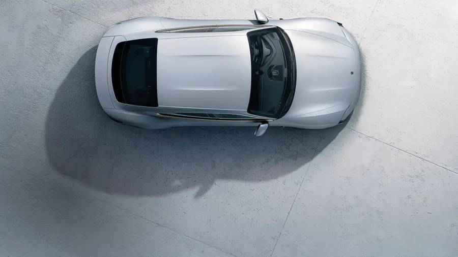 View from above / bird's eye view of Porsche Taycan Turbo S in Ice Grey Metallic.