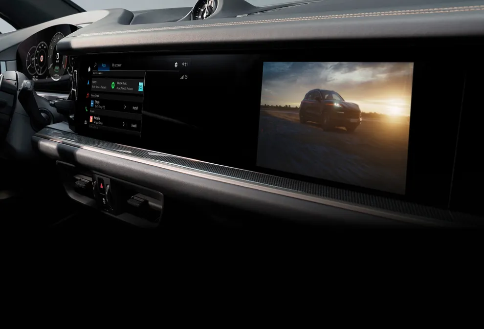 Porsche Cayenne interior: detailed view of the center console control panel with control of the infotainment in the cockpit.