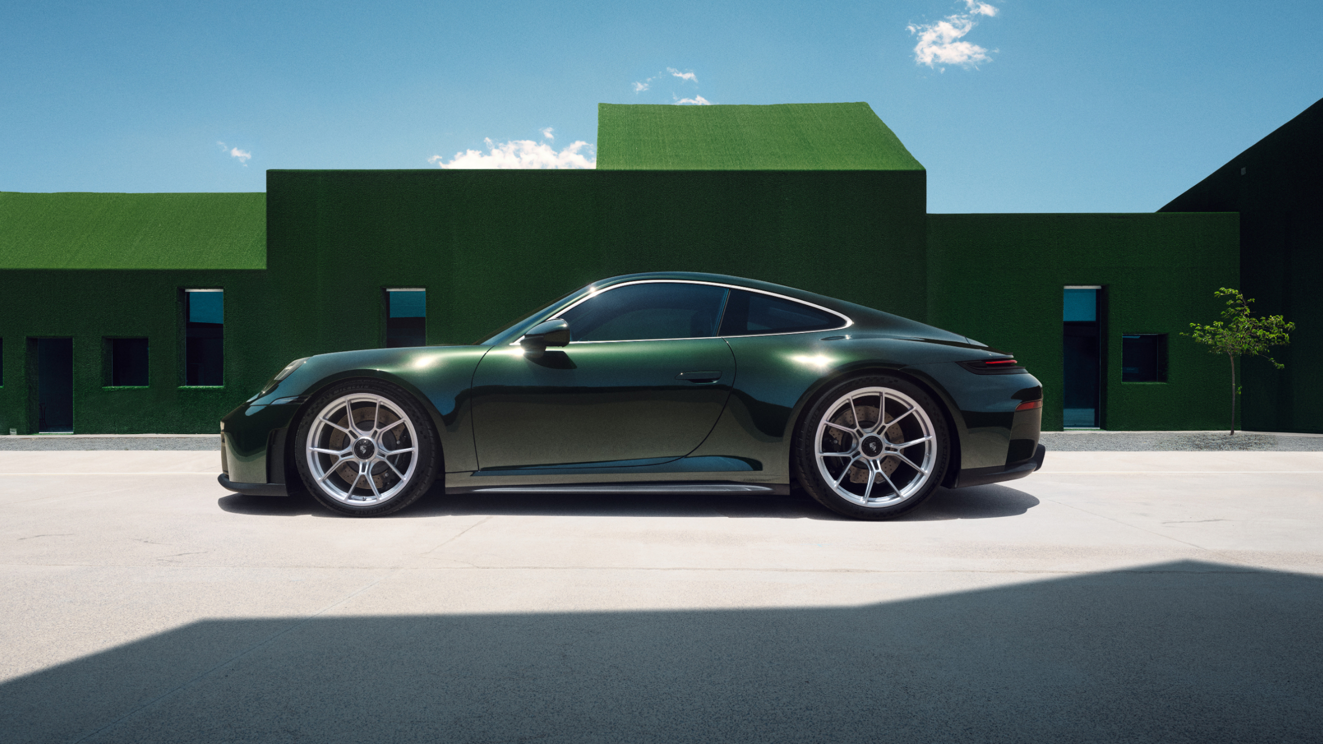 2026 Porsche 911 GT3 Touring front three-quarter studio shot