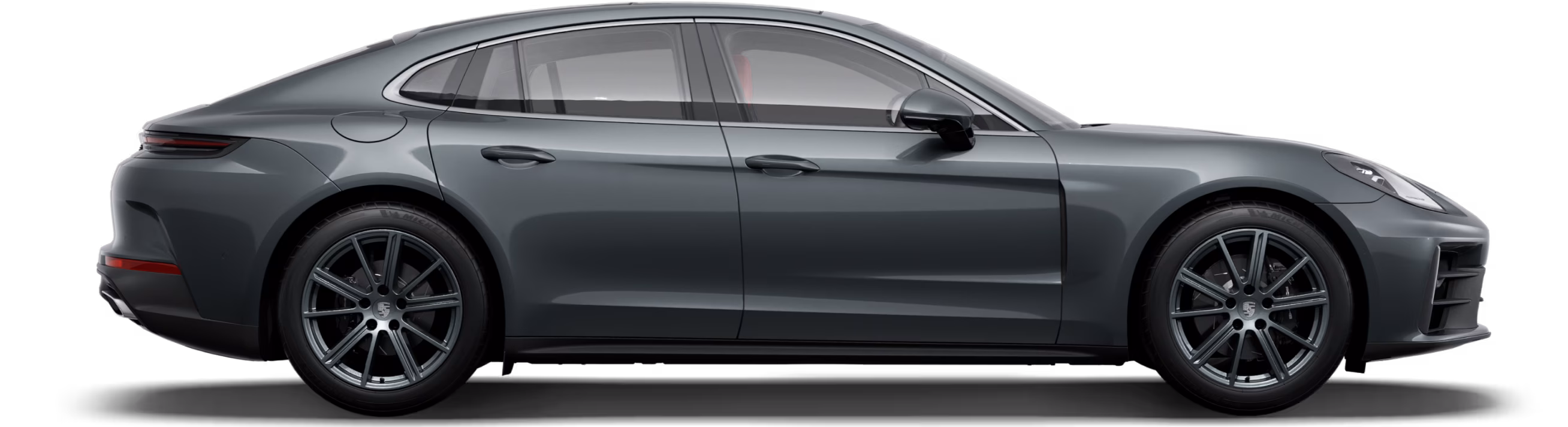 Porsche Panamera 4 in Volcano Grey Metallic in side view / profile.