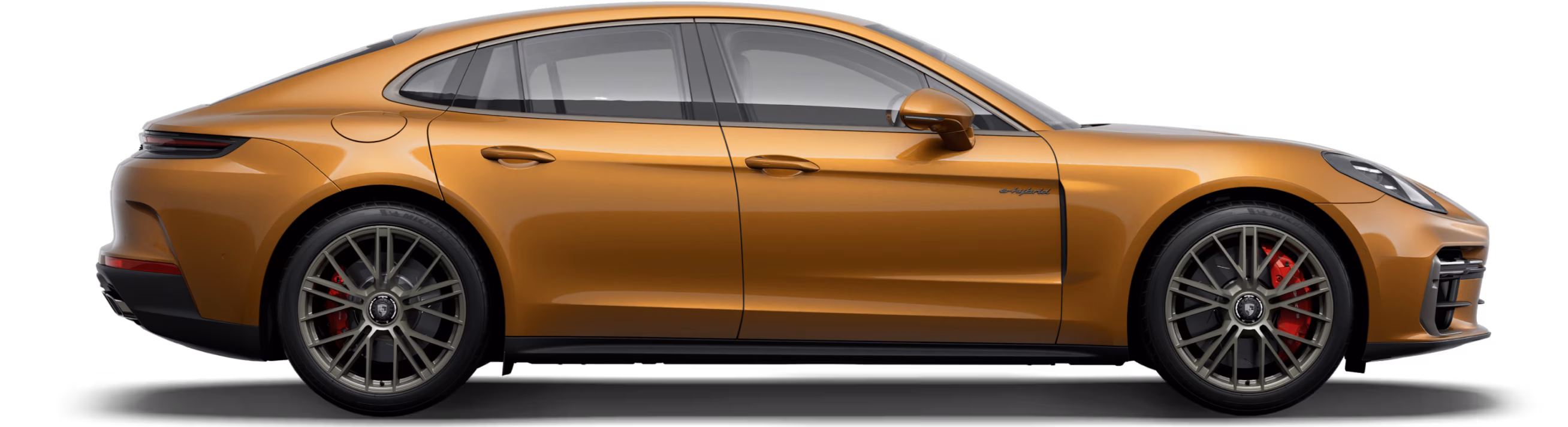 Porsche Panamera Turbo E-Hybrid in Madeira Gold Metallic in side view/profile.