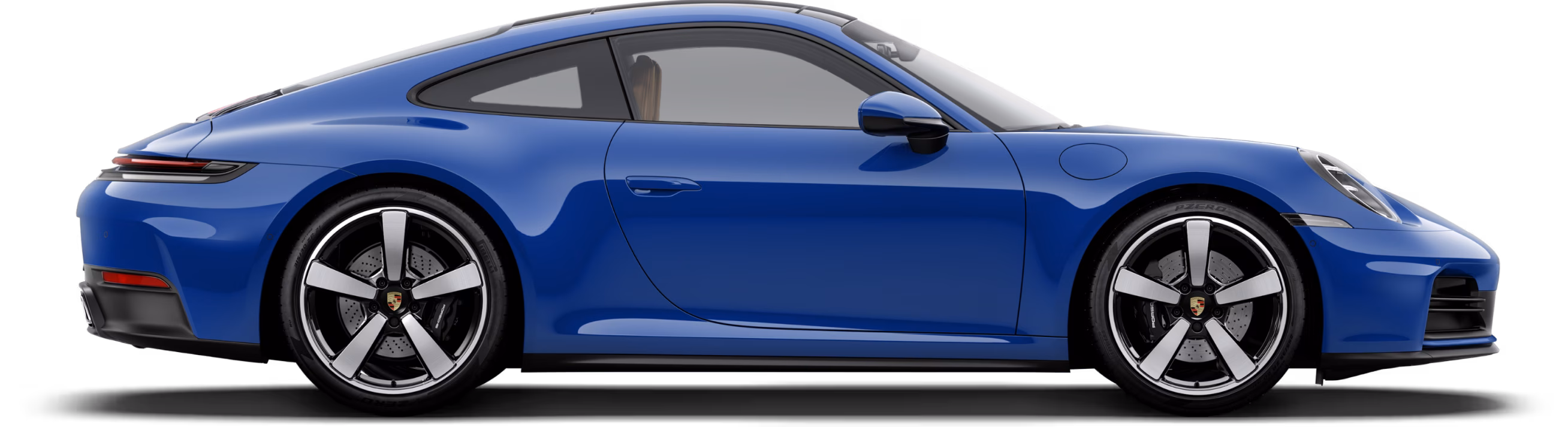 Porsche 911 Carrera in Lugano Blue in profile/side view.