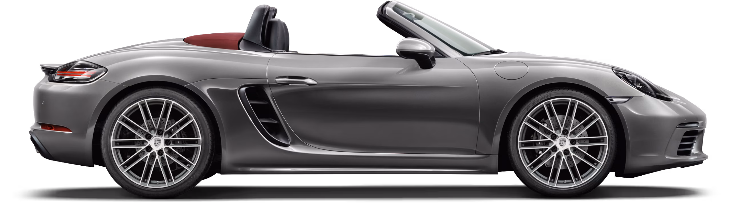 Porsche 718 Boxster in Agate Grey Metallic in side view/in profile.