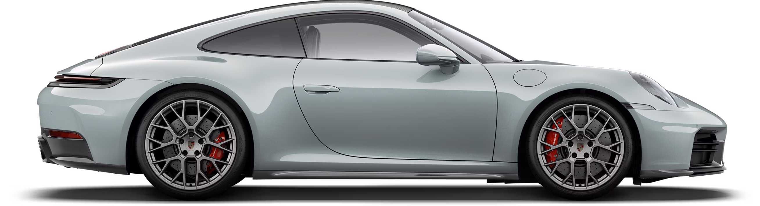 Profile or side view of the Porsche 911 Carrera 4S in Shade Green Metallic.