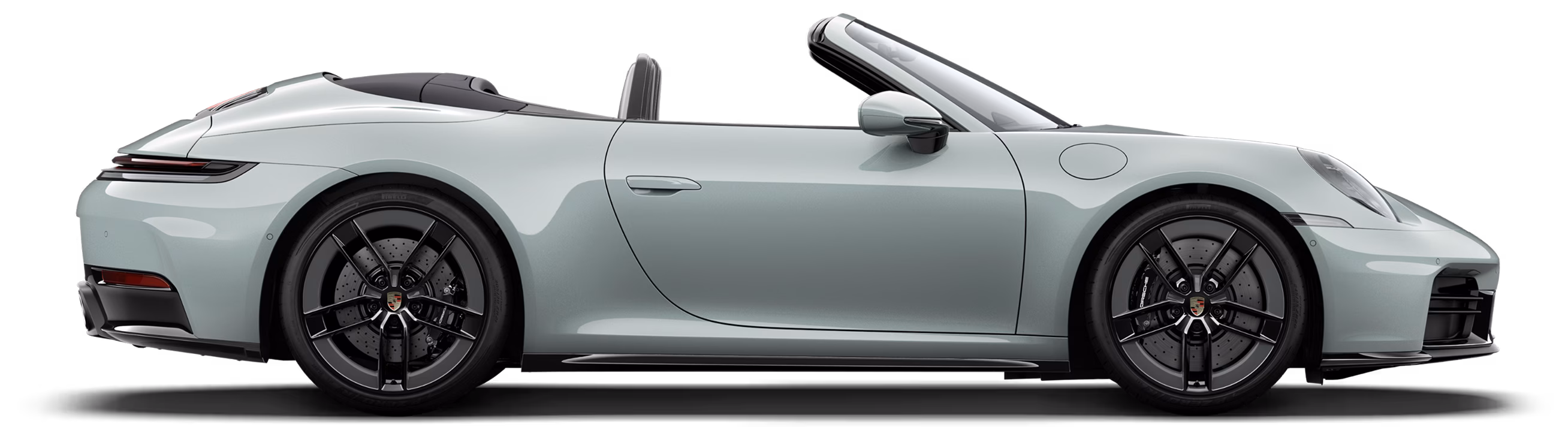Profile or side view of the Porsche 911 Carrera 4S Cabriolet in Shade Green Metallic.