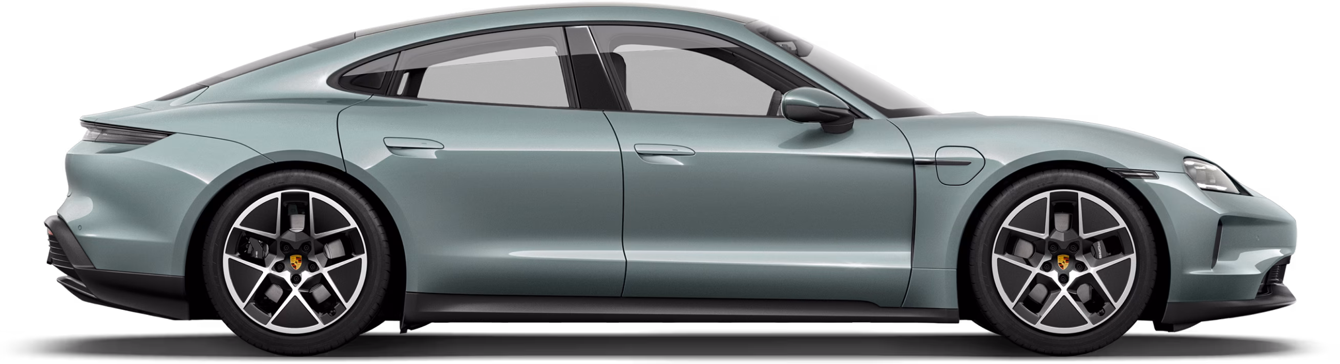 Porsche Taycan in Shade Green Metallic in profile / side view.
