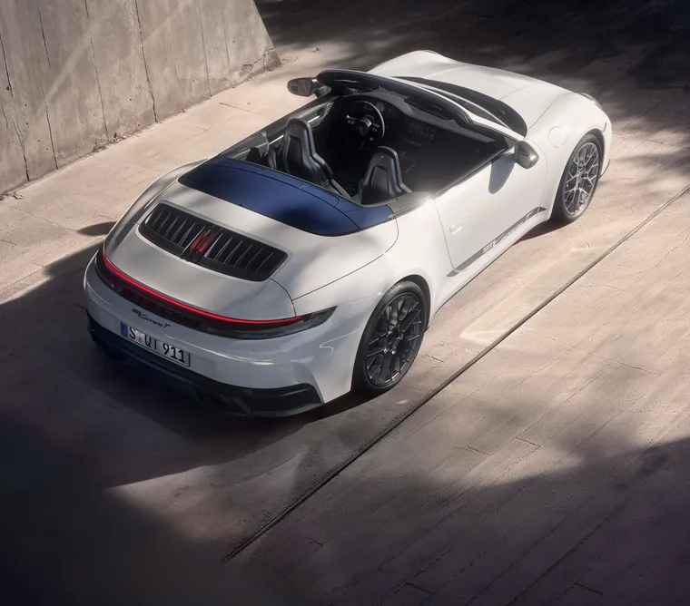 View from above through the open roof into the interior of the Porsche 911 Carrera T Cabriolet.
