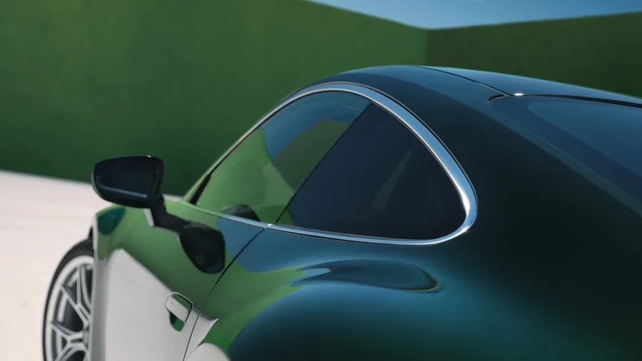 Vue sur le côté de la Porsche 911 GT3 Touring en Oak Green Metallic Neo avec focalisation sur le contour des vitres latérales en aluminium.