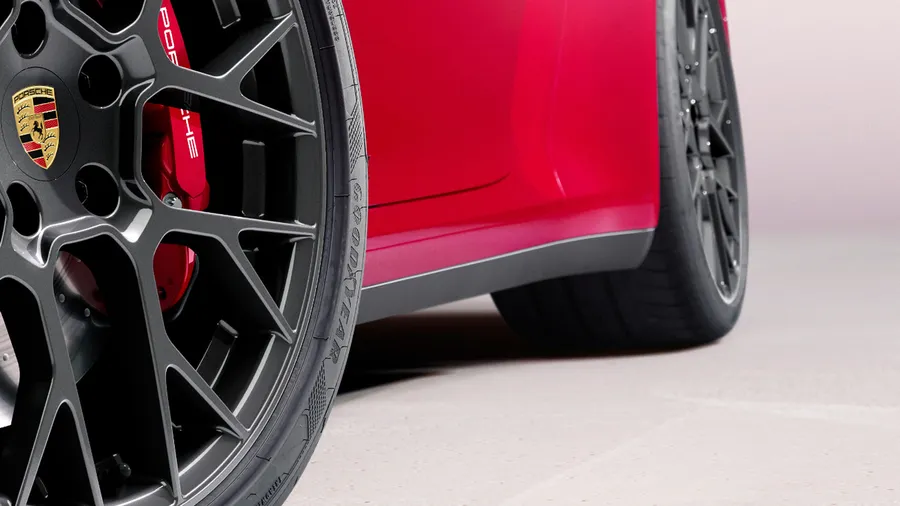Porsche 911 Targa 4 GTS in Carmine Red. Side view.
