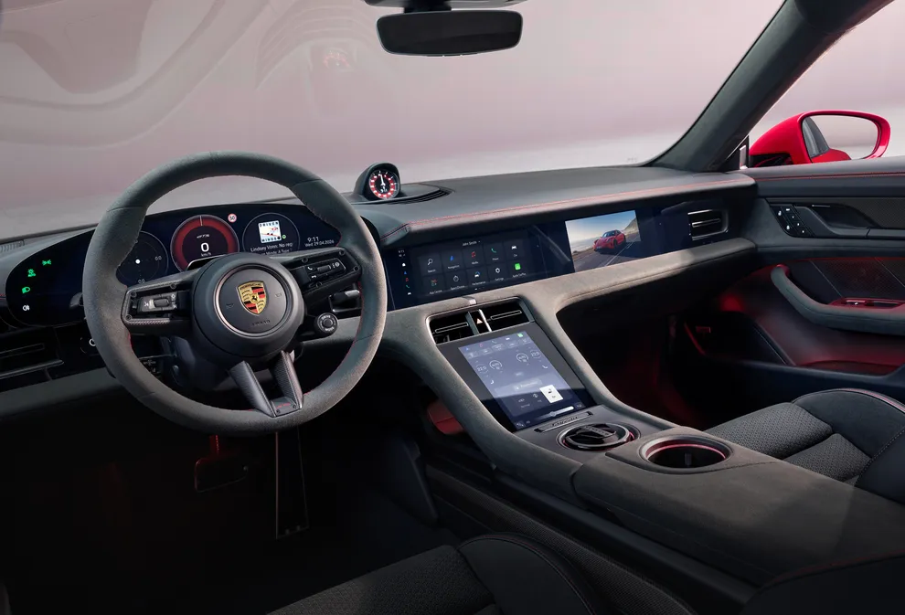 View into the cockpit of the Porsche Taycan GTS focusing on the steering wheel.