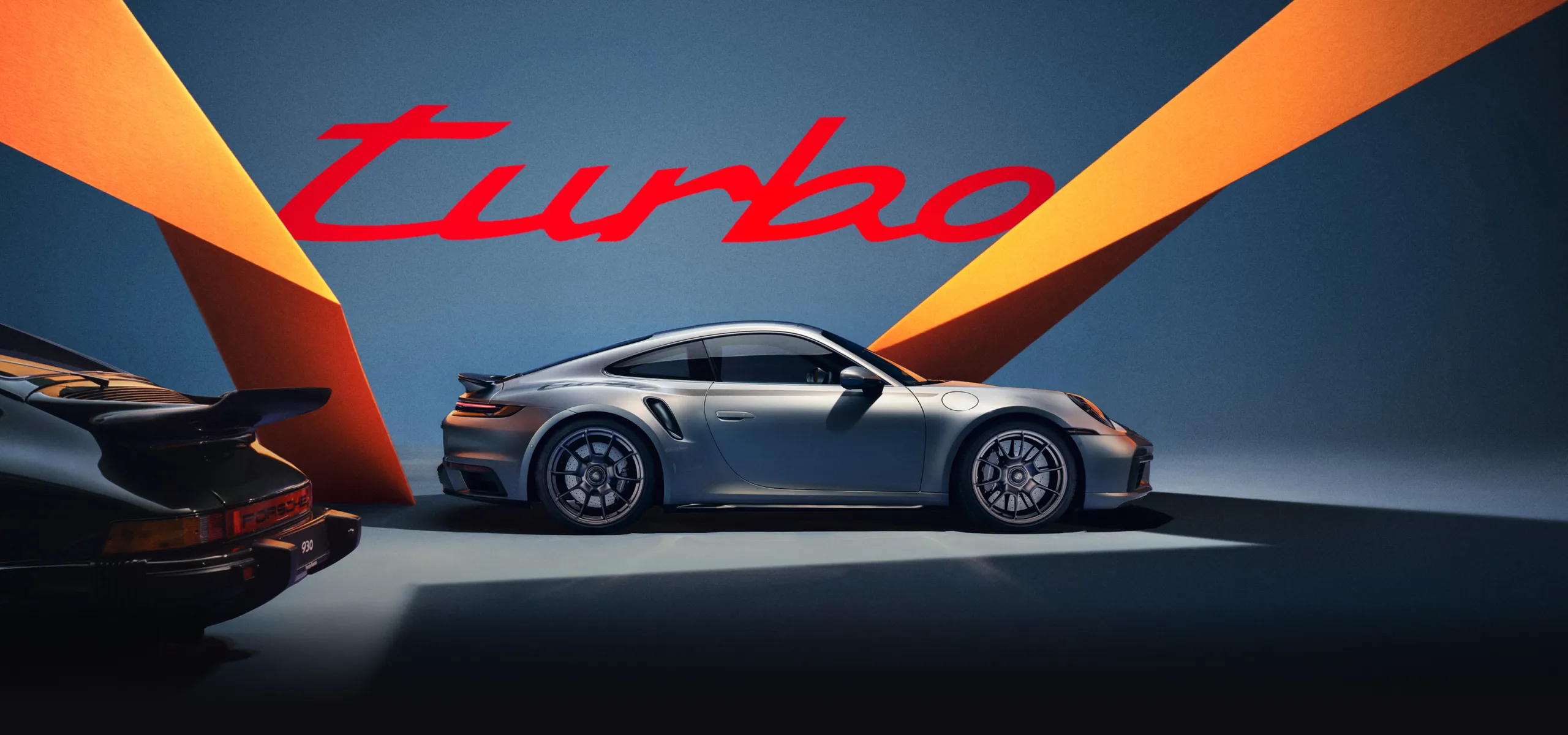 The Porsche 911 Turbo 50 Years in GT Silver Metallic is shown from the side and from the front.