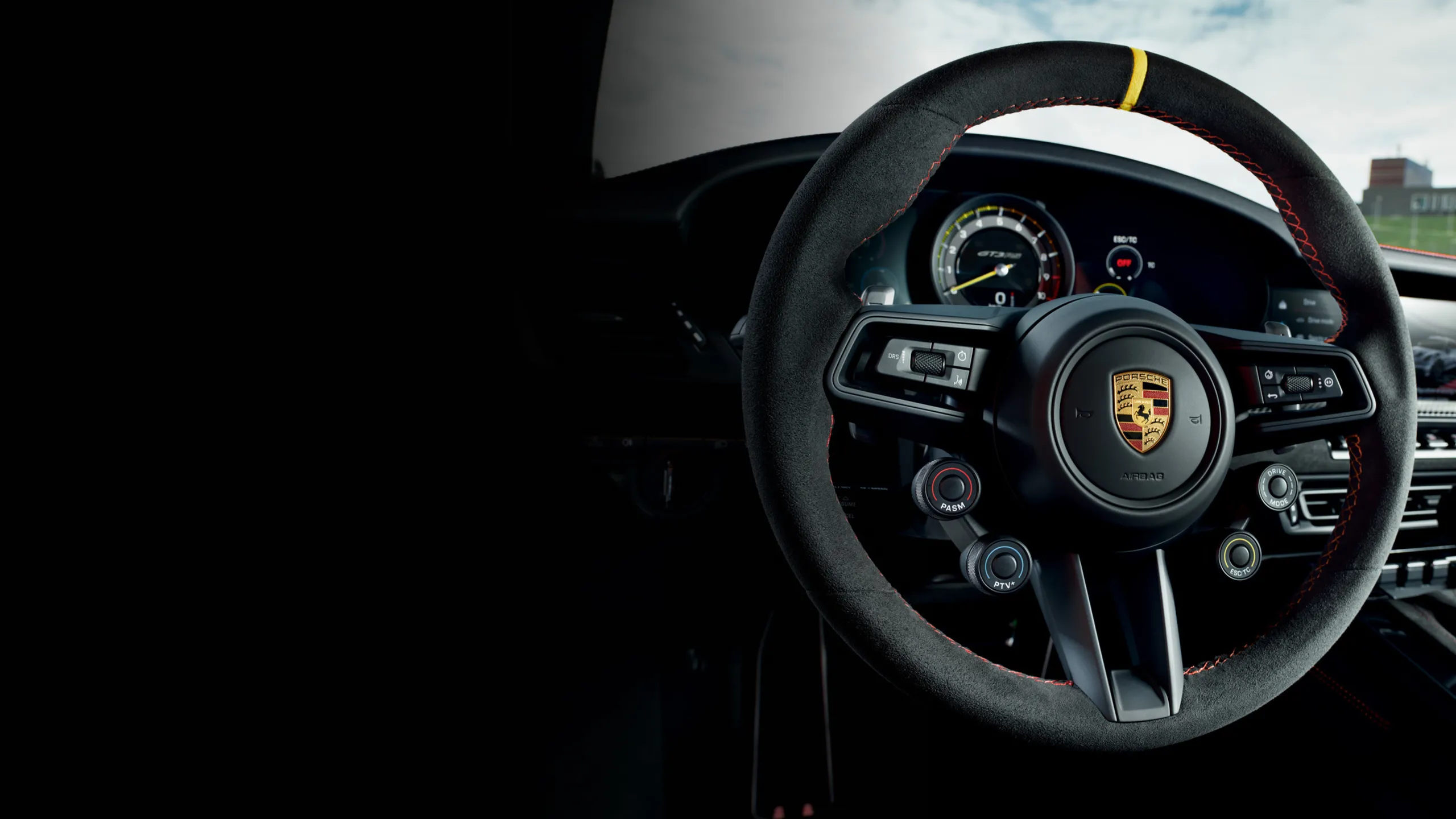 Detailed view of the steering wheel of the Porsche 911 GT3 RS.
