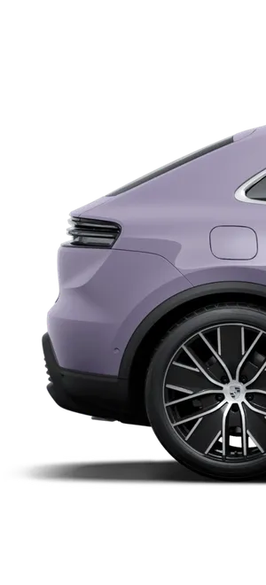 Porsche Macan in Frozenbluemetallic im Profil / Seitenansicht.