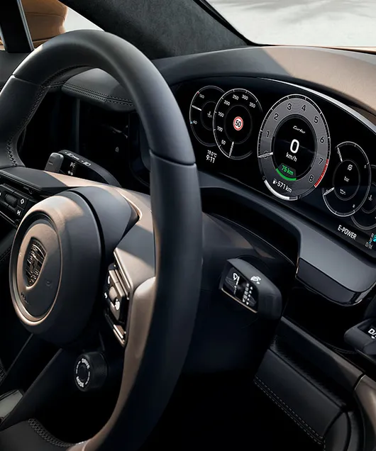 Close view studio shot of the steering wheel of a Panamera.
