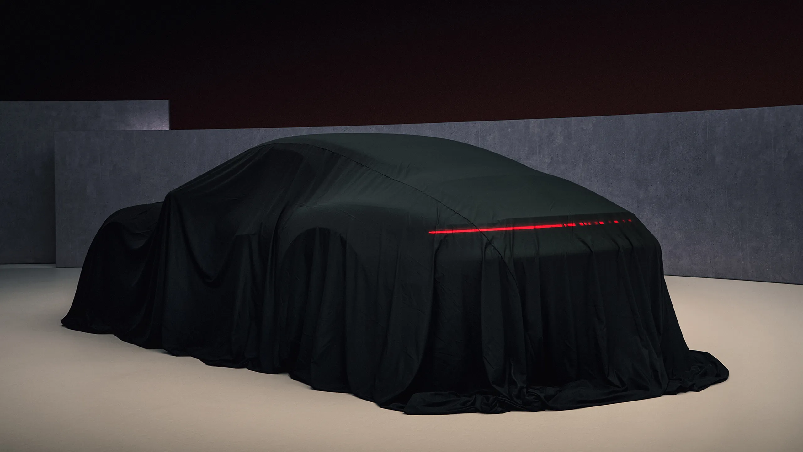 Teaser for a new vehicle from Porsche.